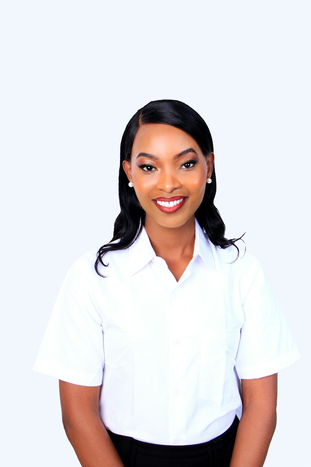 Studio portrait of a Black businesswoman smiling at the camera