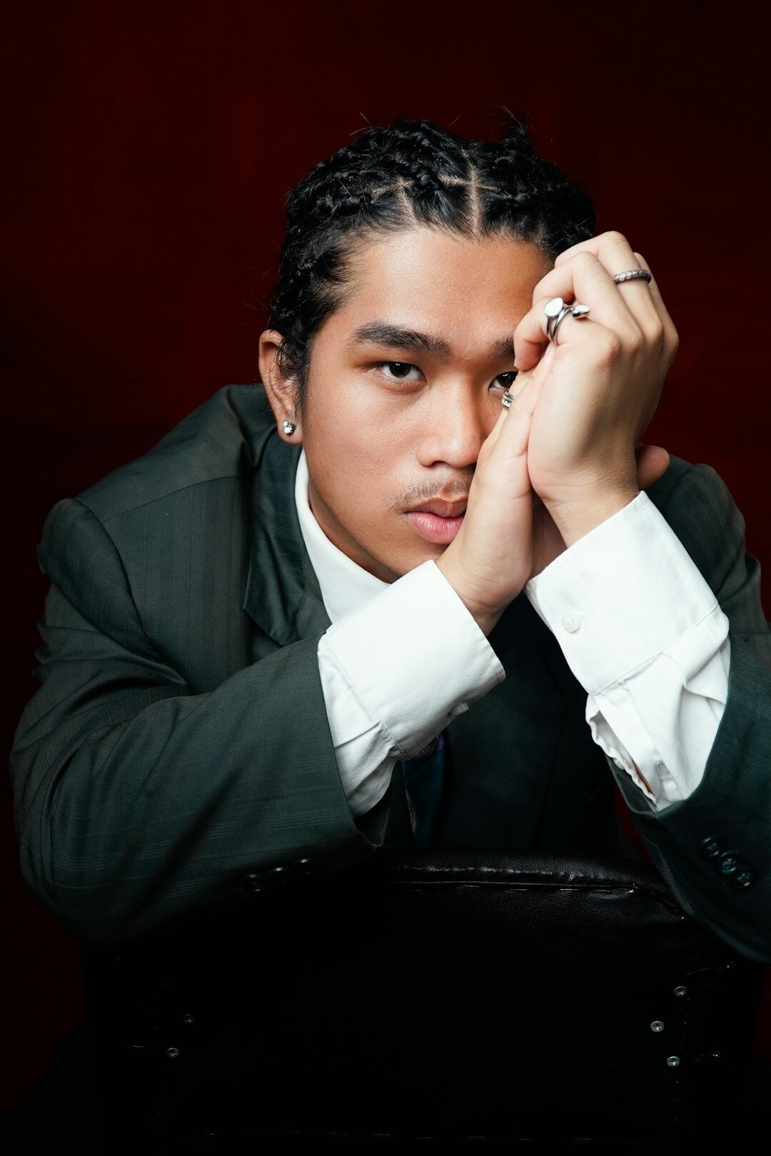Studio portrait of a man of North African descent in a blazer