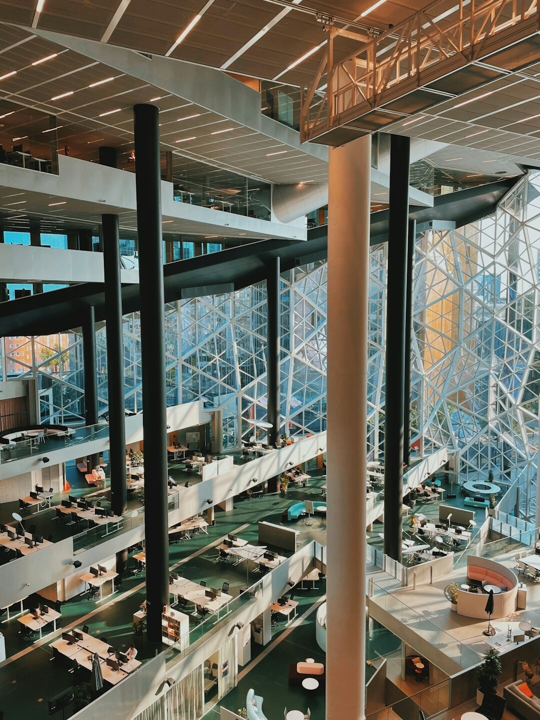 Modern open-plan office with employees working at desks